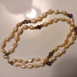 White and purple bead bracelet